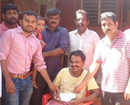 DYFI – Bajal unit helps distressed family of Vaman Nayak who lost both legs in tragedy